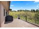 Spacious wooden deck with forest views, perfect for outdoor entertaining and relaxation at 1621 Baneberry Ln, Golden, CO 80401