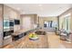 Bright kitchen features granite counters, stainless appliances, and breakfast bar seating at 1621 Baneberry Ln, Golden, CO 80401