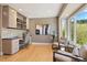 This office area has built-in cabinets, shelving, and a large window with natural light at 1621 Baneberry Ln, Golden, CO 80401