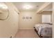 Cozy bedroom featuring a comfortable bed with Parisian-themed decor and ample closet space at 12330 Village E Cir, Commerce City, CO 80603