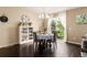 Charming dining area with backyard access and natural light at 12330 Village E Cir, Commerce City, CO 80603