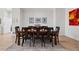 Dining room with table and chairs and decorated with tasteful art at 301 Garfield St # 1E, Denver, CO 80206