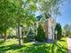 Beautiful multi-story brick home with lush landscaping and a well-manicured lawn at 301 Garfield St # 1E, Denver, CO 80206