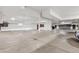 Spacious parking garage featuring ample space for parking, with white walls and ceilings at 301 Garfield St # 1E, Denver, CO 80206