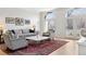 Cozy living room with comfortable seating, natural light, and stylish accents at 301 Garfield St # 1E, Denver, CO 80206