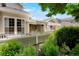 Cozy back porch with a retractable awning providing an outdoor living space at 5155 W Quincy Ave # 101, Denver, CO 80236
