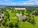 Picturesque aerial view of the beautiful Pinehurst Country Club at 5155 W Quincy Ave # 101, Denver, CO 80236
