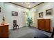 Inviting living room featuring bright window and views of the outside at 5155 W Quincy Ave # 101, Denver, CO 80236