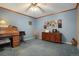 Office or flex room includes wooden desk and room for a seating area at 5155 W Quincy Ave # 101, Denver, CO 80236