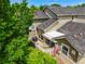 View of cozy patio, perfect for outdoor dining with grill and table and chairs at 5155 W Quincy Ave # 101, Denver, CO 80236