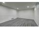Unfinished basement with paneled walls and recessed lighting at 7396 S Knolls Way, Centennial, CO 80122