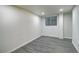 Unfinished basement with paneled walls and recessed lighting at 7396 S Knolls Way, Centennial, CO 80122