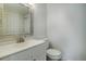 Stylish half bathroom showcasing modern tile and vanity at 7396 S Knolls Way, Centennial, CO 80122