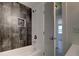 Modern bathroom with tiled bathtub and shower combination at 7396 S Knolls Way, Centennial, CO 80122