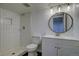 Updated bathroom showcasing a tiled shower and modern vanity at 7396 S Knolls Way, Centennial, CO 80122