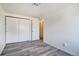 Bedroom with a closet and wood-look flooring at 7396 S Knolls Way, Centennial, CO 80122
