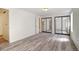 Spacious bedroom with contemporary flooring and mirrored closet at 7396 S Knolls Way, Centennial, CO 80122