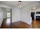 Bright dining room with hardwood floors, modern lighting, and easy access to the kitchen at 7396 S Knolls Way, Centennial, CO 80122