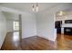 Open dining area with hardwood floors and kitchen view at 7396 S Knolls Way, Centennial, CO 80122