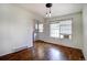 Bright dining room features hardwood floors and stylish pendant lighting at 7396 S Knolls Way, Centennial, CO 80122