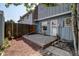 Concrete patio and partially fenced backyard at 7396 S Knolls Way, Centennial, CO 80122