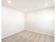 Clean bedroom featuring neutral carpeting, recessed lighting, and white walls at 6068 Corral St, Brighton, CO 80601