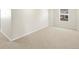 A bedroom with carpet has a window at 6068 Corral St, Brighton, CO 80601
