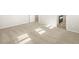Spacious bedroom featuring neutral carpet, white walls, baseboard trim, and natural light from window at 6068 Corral St, Brighton, CO 80601