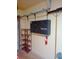 Garage interior featuring storage shelving, a black storage cabinet, and a red fire extinguisher at 12655 E Pacific Cir # E, Aurora, CO 80014