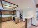 Kitchen with tile backsplash and an island cooktop at 1076 S Leyden St, Denver, CO 80224