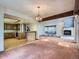 Open floor plan with a view of the kitchen and fireplace at 1076 S Leyden St, Denver, CO 80224