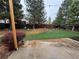 Enjoy the spacious backyard with a lovely lawn, trees, and stone landscaping, perfect for outdoor relaxation at 9806 Hooker Ct, Denver, CO 80031
