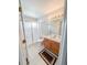 Cozy bathroom featuring a shower with a glass door, and a vanity at 9806 Hooker Ct, Denver, CO 80031
