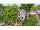 Charming two-story home with unique architectural details and mature trees at 3254 Newton St, Denver, CO 80211