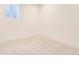 Clean, empty basement space with a small window at 4350 S Delaware St, Englewood, CO 80110
