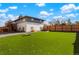 Expansive backyard features lush artificial turf, creating a perfect low-maintenance outdoor living space at 6163 W 76Th Ave, Arvada, CO 80003