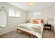 Cozy bedroom with natural light, stylish decor, and a comfortable bed at 6163 W 76Th Ave, Arvada, CO 80003