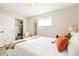 Inviting bedroom featuring a closet, soft lighting, and calm colors at 6163 W 76Th Ave, Arvada, CO 80003