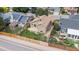 Aerial view of a charming home with a well-kept lawn and fenced yard, providing a sense of privacy at 10152 Telluride St, Littleton, CO 80125