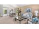 Bright living room and dining area with modern decor and a view of the outdoors at 10152 Telluride St, Littleton, CO 80125