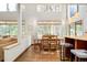 Open dining area with large windows offering outdoor views, perfect for entertaining at 2253 Augusta Dr, Evergreen, CO 80439