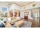 Open concept living space with hardwood floors and tall ceilings at 2253 Augusta Dr, Evergreen, CO 80439