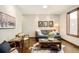 Cozy living room with hardwood floors, modern furniture, and ample natural light at 2253 Augusta Dr, Evergreen, CO 80439