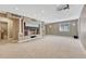 Finished basement featuring carpet, shelving alcove, wet bar, and recessed lights at 570 Stonemont Dr, Castle Pines, CO 80108