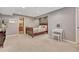 Bedroom with neutral paint, carpet, furnishings and décor at 570 Stonemont Dr, Castle Pines, CO 80108