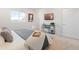 Serene bedroom with plush carpeting, modern decor, and ample natural light for a peaceful retreat at 8582 Cheraw St, Littleton, CO 80125