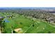 Expansive aerial view of the golf course and surrounding neighborhood at 1622 Monroe St, Denver, CO 80206