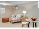 Finished basement featuring plush carpeting, sectional seating, and a cozy ambiance at 1622 Monroe St, Denver, CO 80206