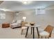 Finished basement featuring plush carpeting, sectional seating, and a cozy ambiance at 1622 Monroe St, Denver, CO 80206