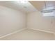 This bedroom has neutral colored walls, white trim, a window, carpet, and a ceiling light at 1622 Monroe St, Denver, CO 80206